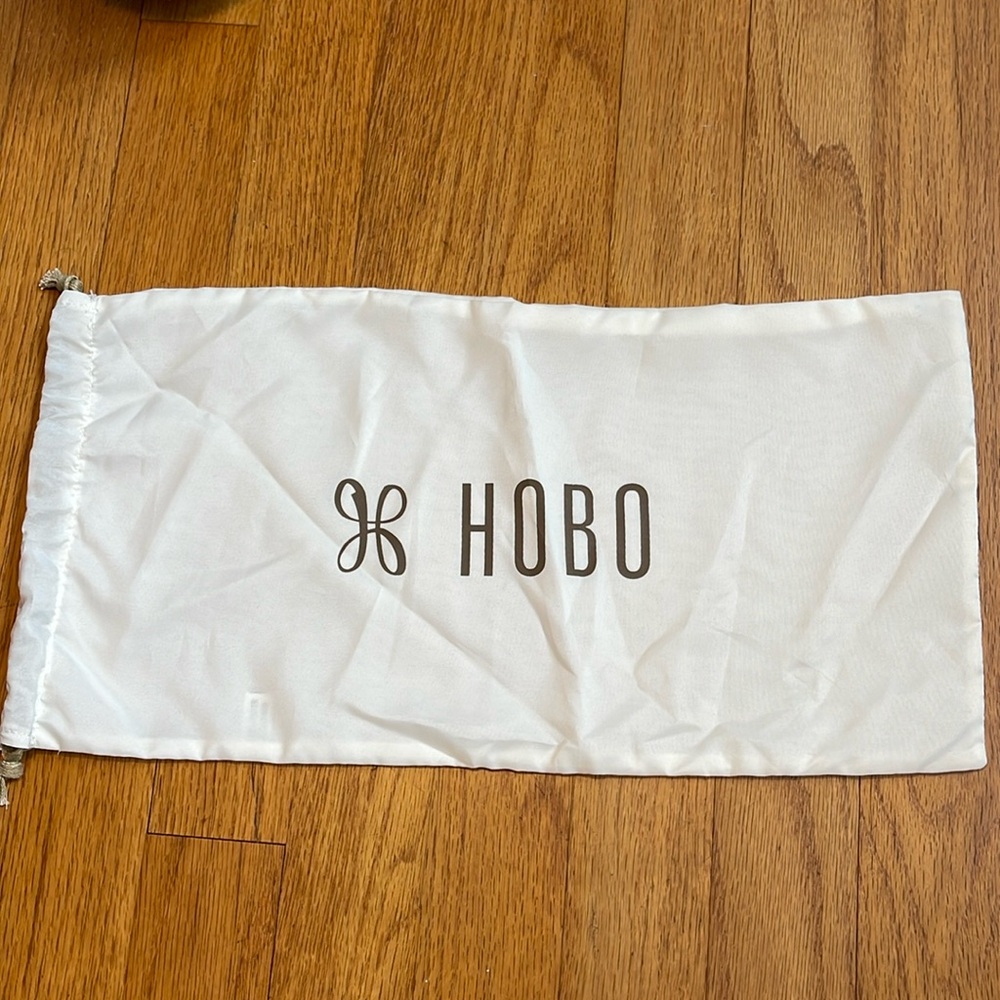 HOBO bags dust bag. Brand new. 16”x8”. Cream with tan accent. Drawstring.